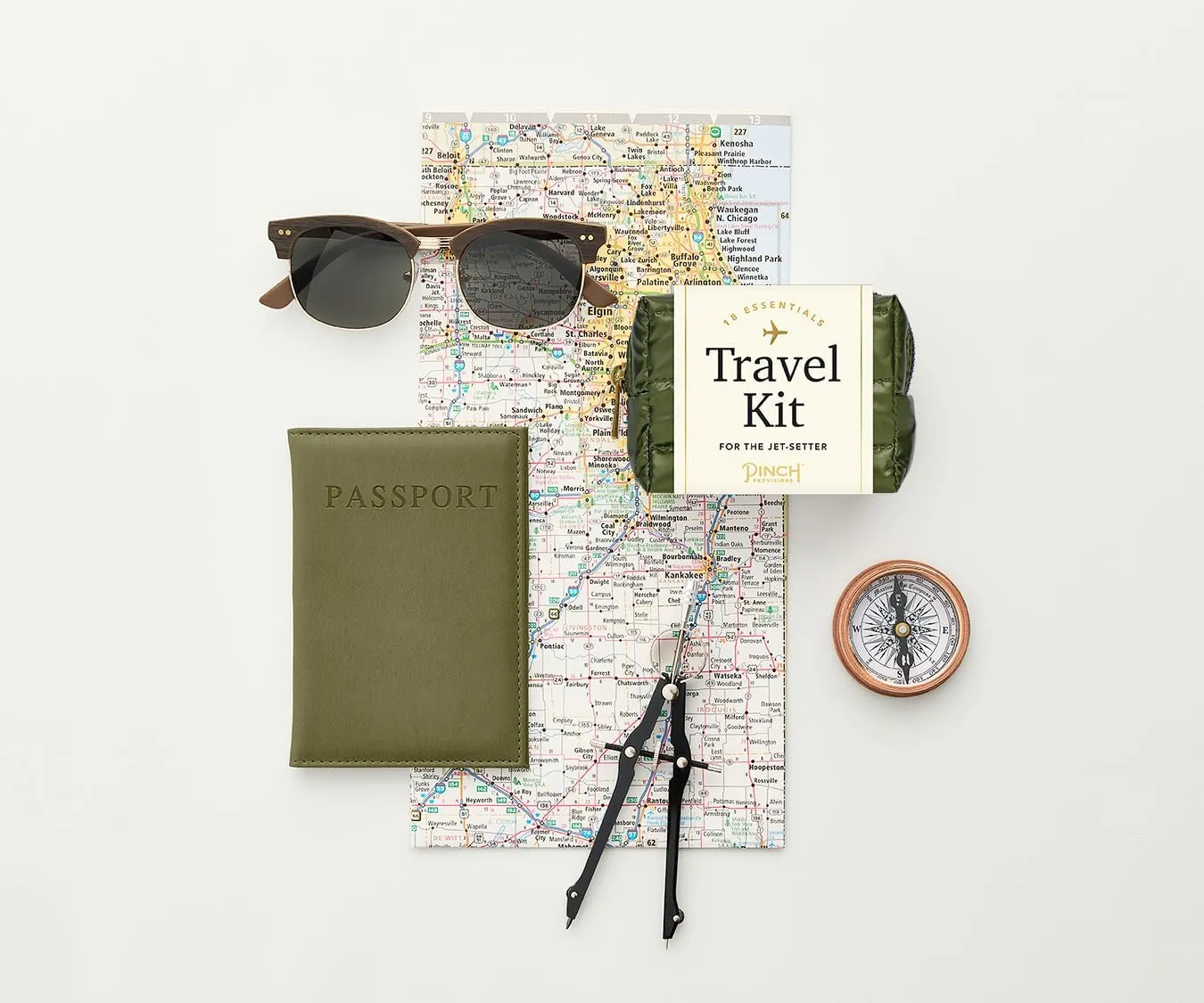 Pinch Provisions Green Puffer Travel Kit, 18 Must-Have Travel Essentials, Ideal Road Trip or Airport Gift for Friends, Family & Peers, Portable Compact Zipper Pouch