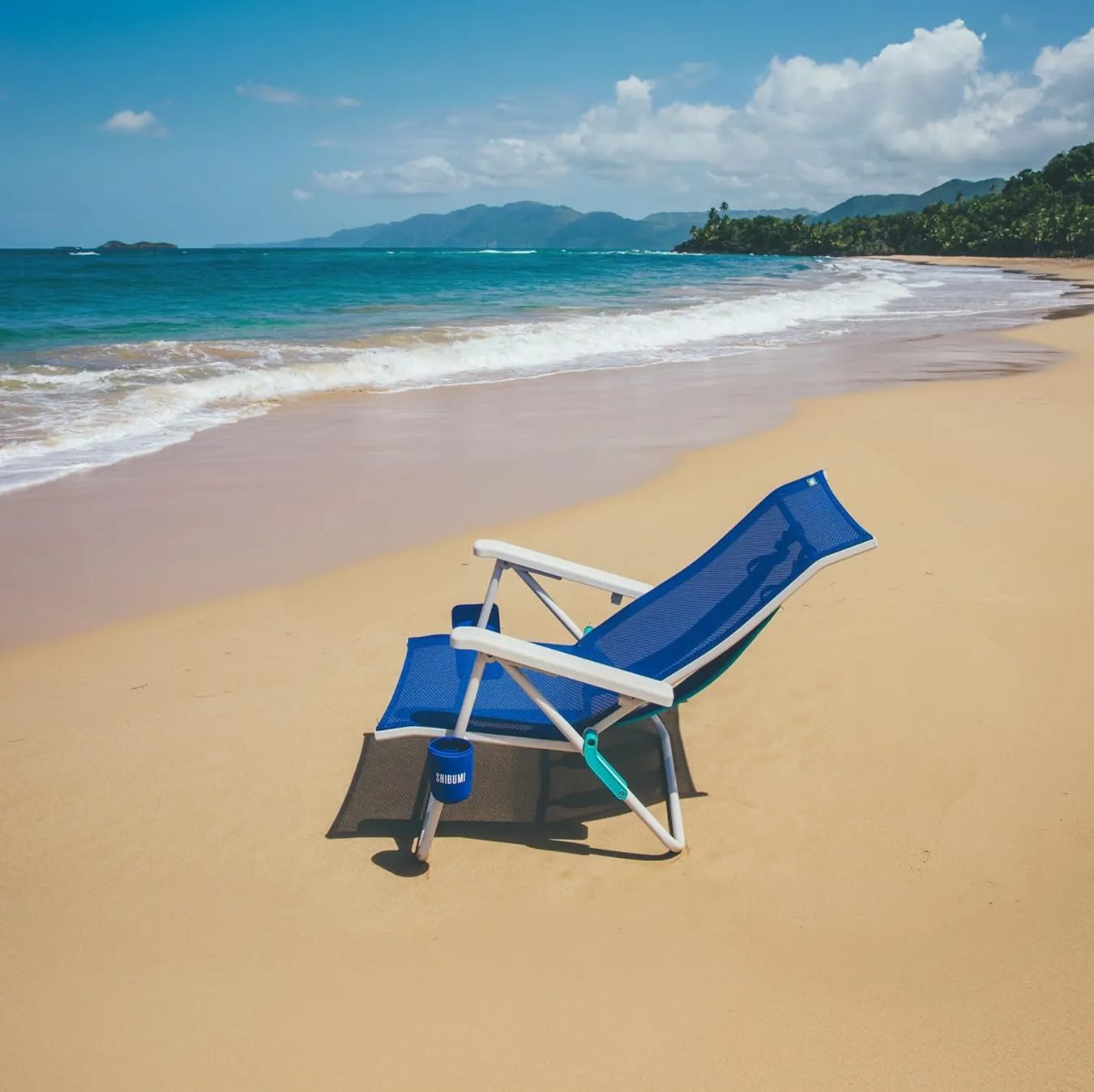 Shibumi Beach Chair. Anti-Rust Marine Grade Frame. 300lb Capacity. Weighs 8 Pounds. Adjustable Padded Backpack Straps. Breathable DreamWave Fabric.